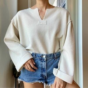 Urban Outfitters - Rib Knit Cuffed Flare
Sleeve Oversized Sweater